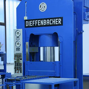 A blue Dieffenbacher hydraulic press